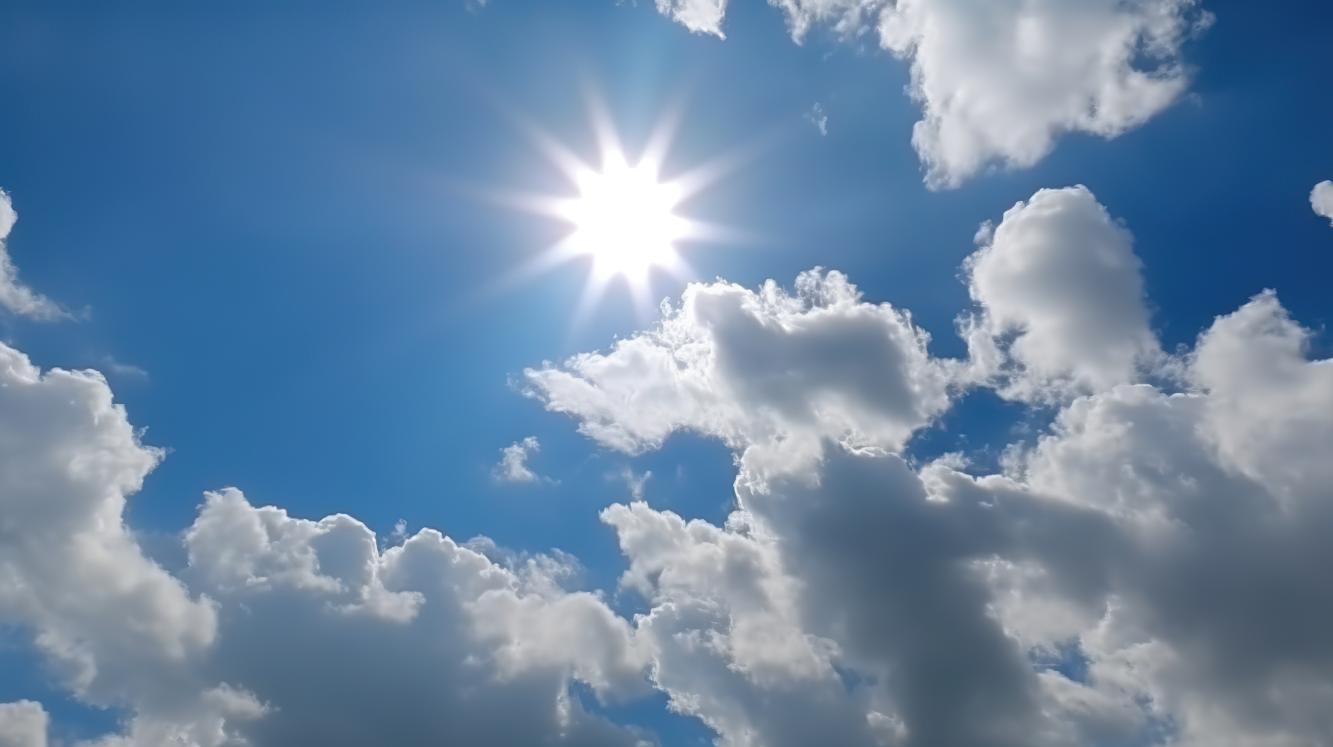 Beautiful Sun Shining Through Soft Clouds in Sky
