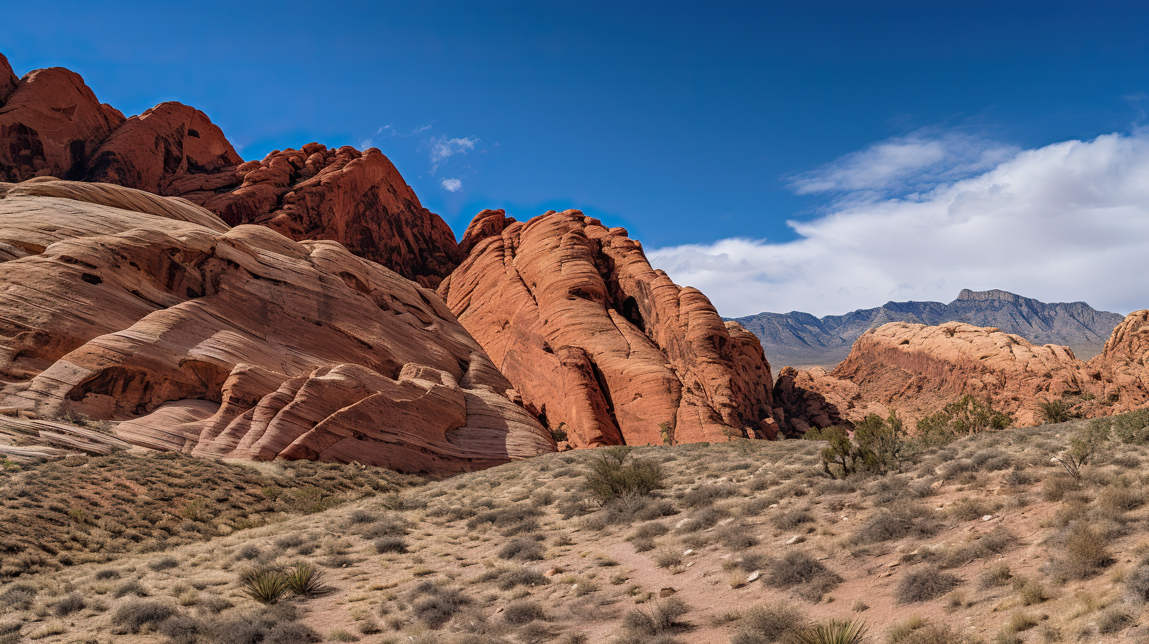 Beautiful red sandstones cliffs, desert view with the blue sky