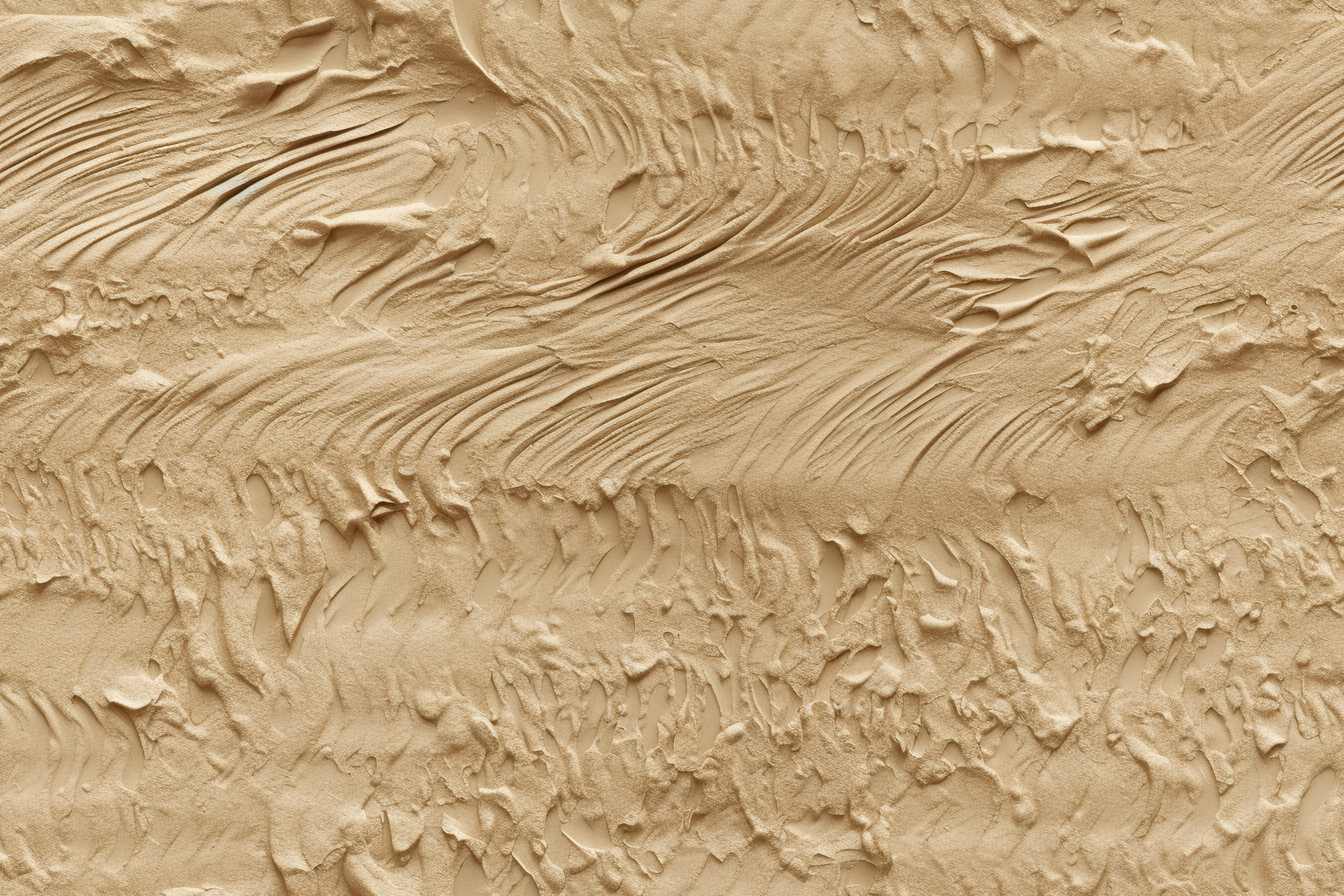 A wall with a rough surface is painted off white