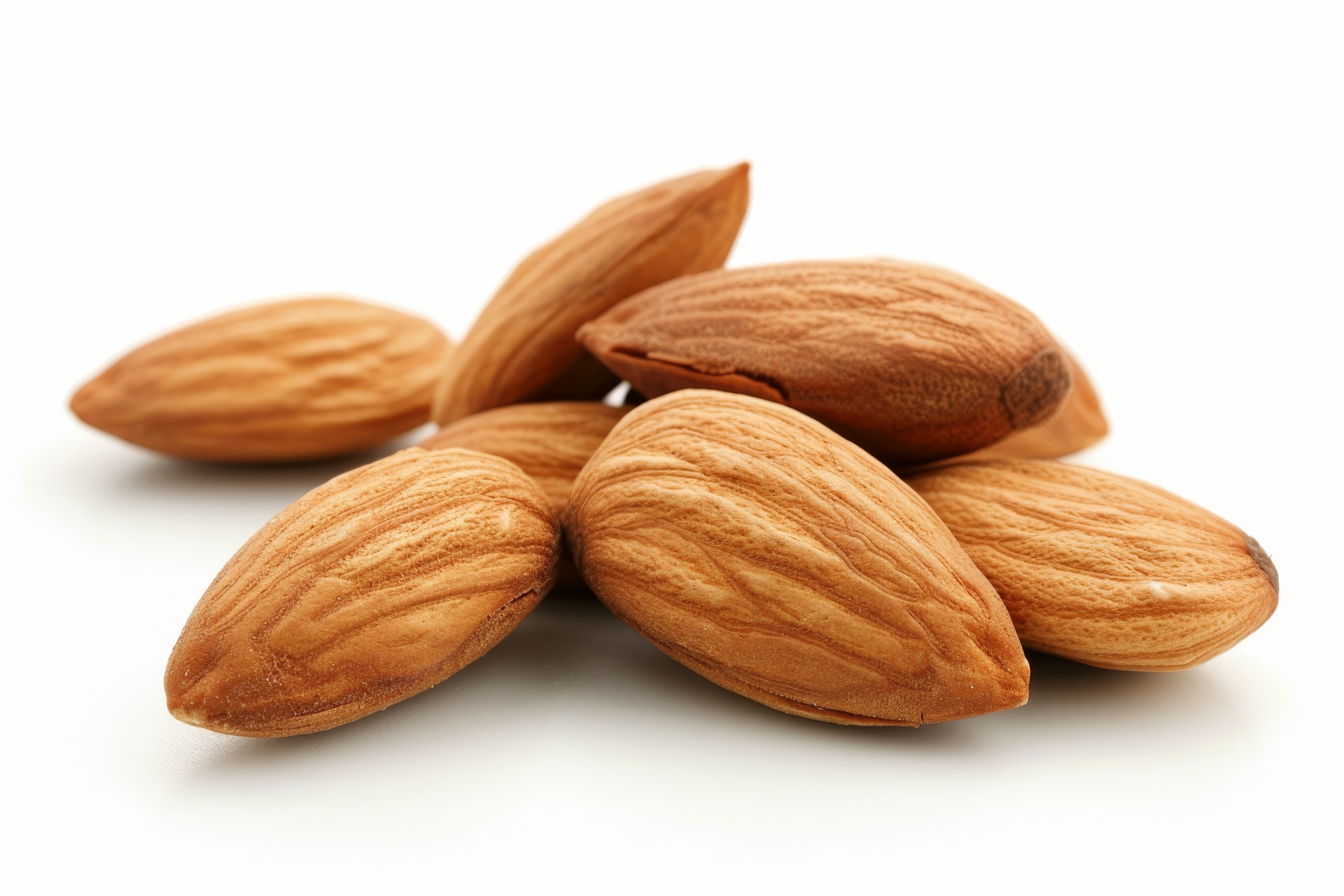 Group of almonds isolated on white Background