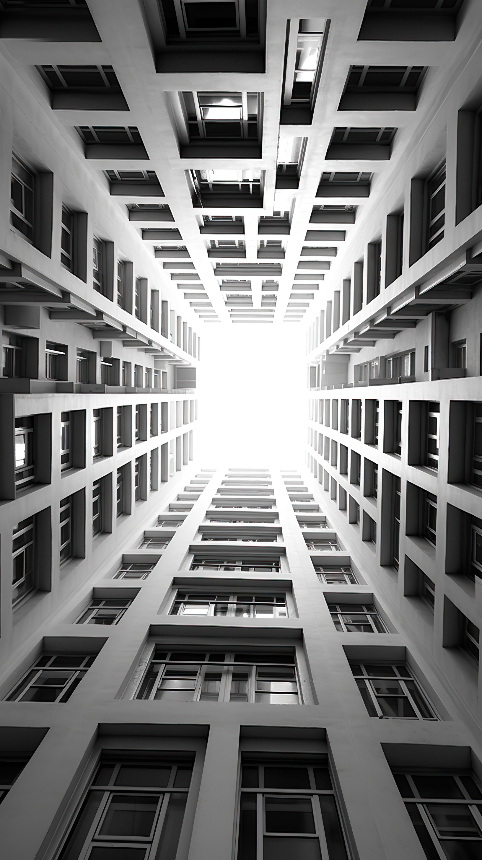 Lending lines of windows, low angle photography of buildings