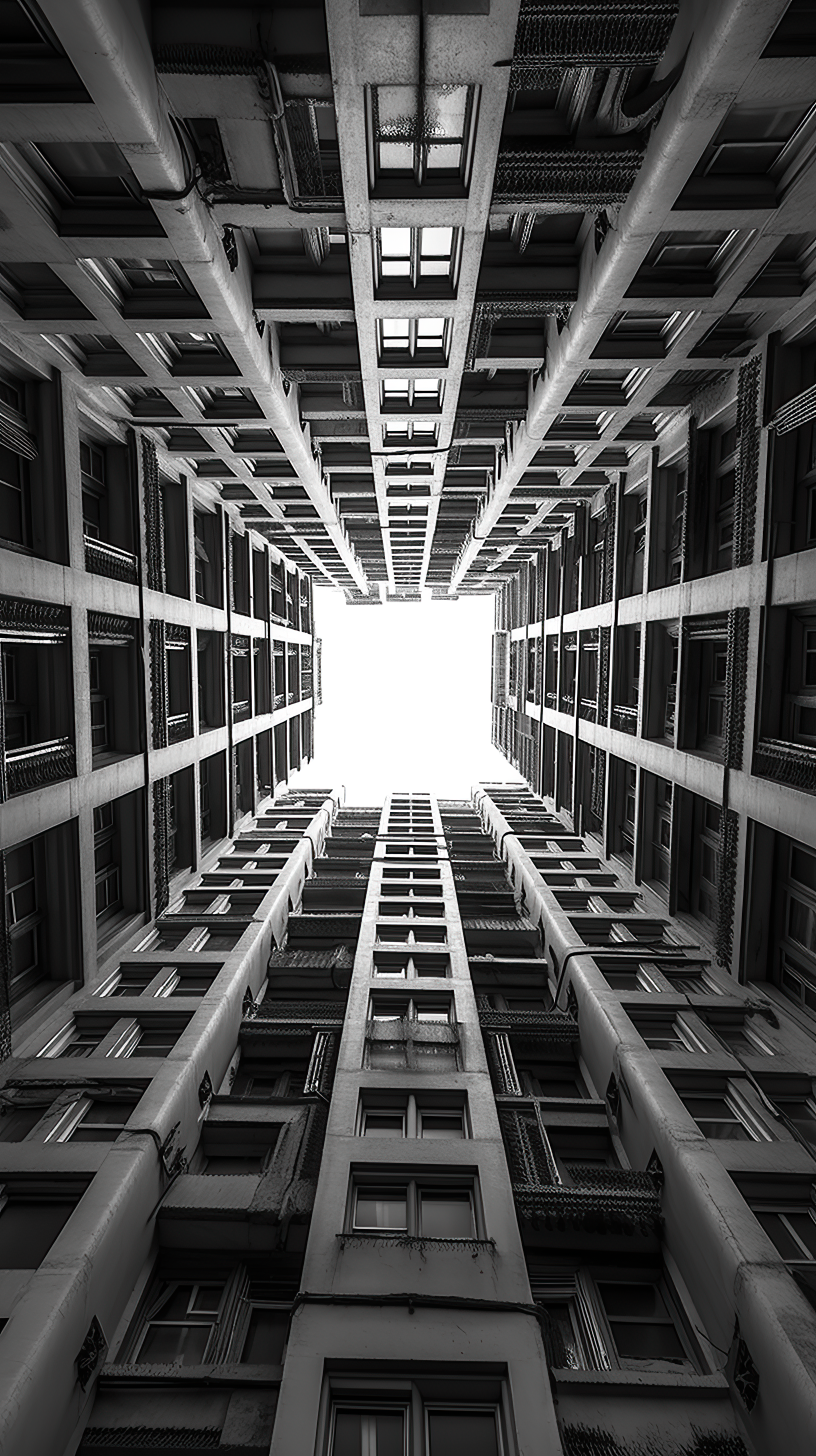 Lending lines of windows, low angle photography of buildings