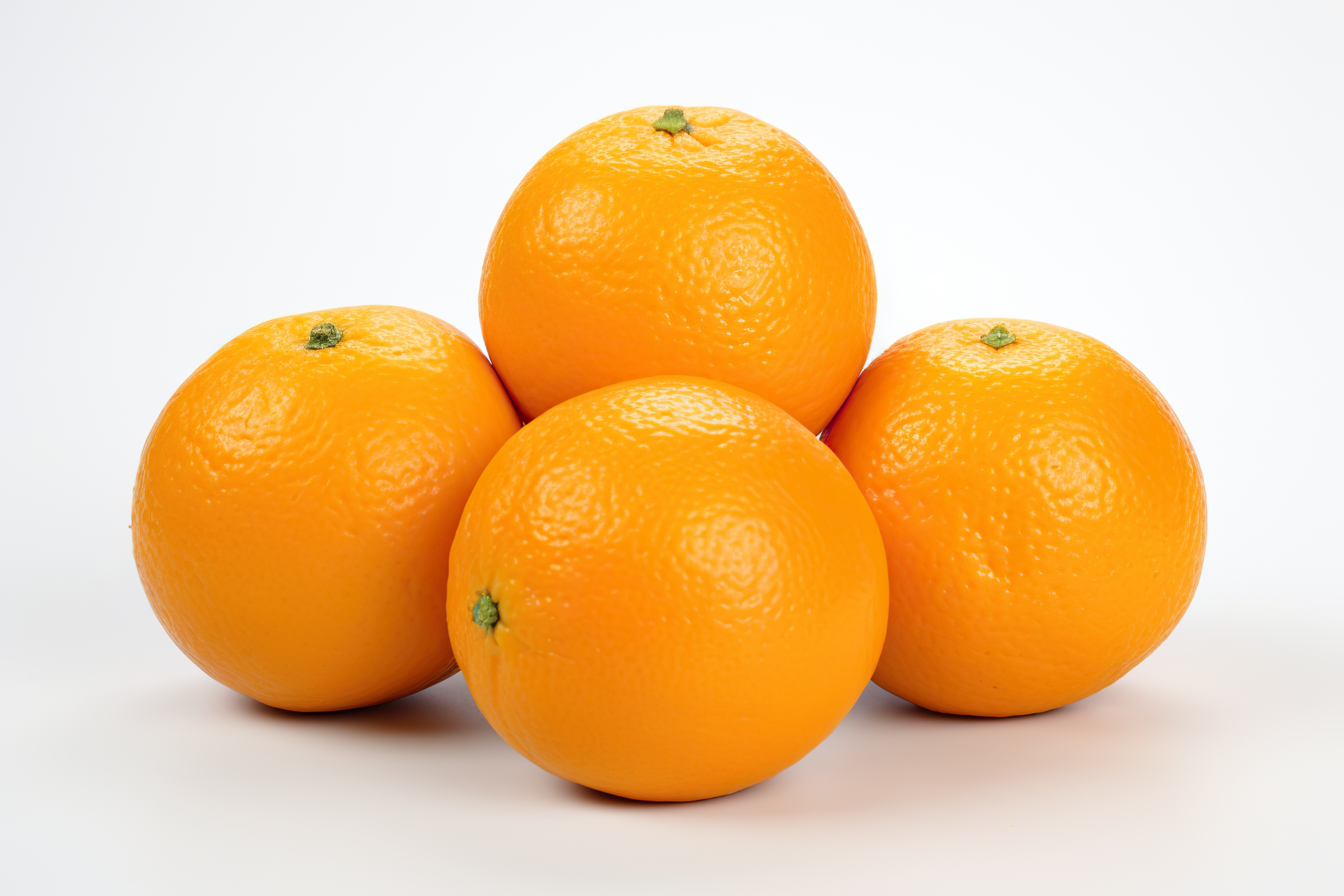 Orange fruit with leaves isolated on white background