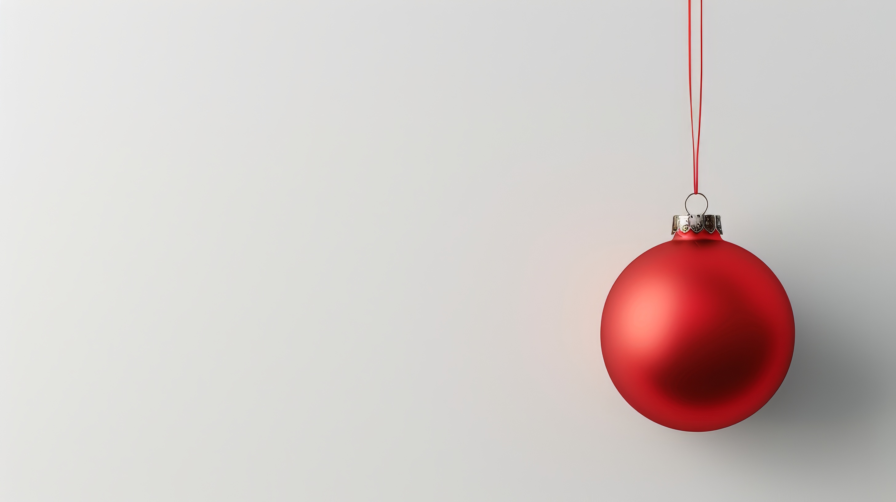 Red ball. Christmas decoration on white background