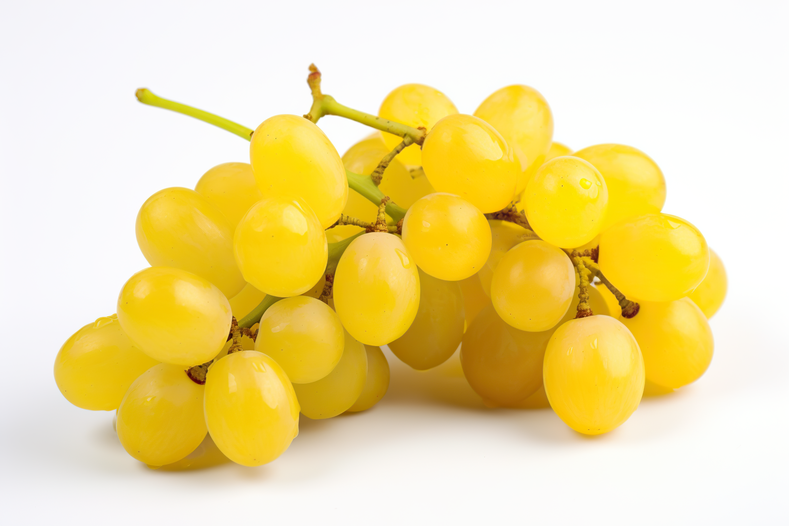 Ripe yellow grapes isolated on white background