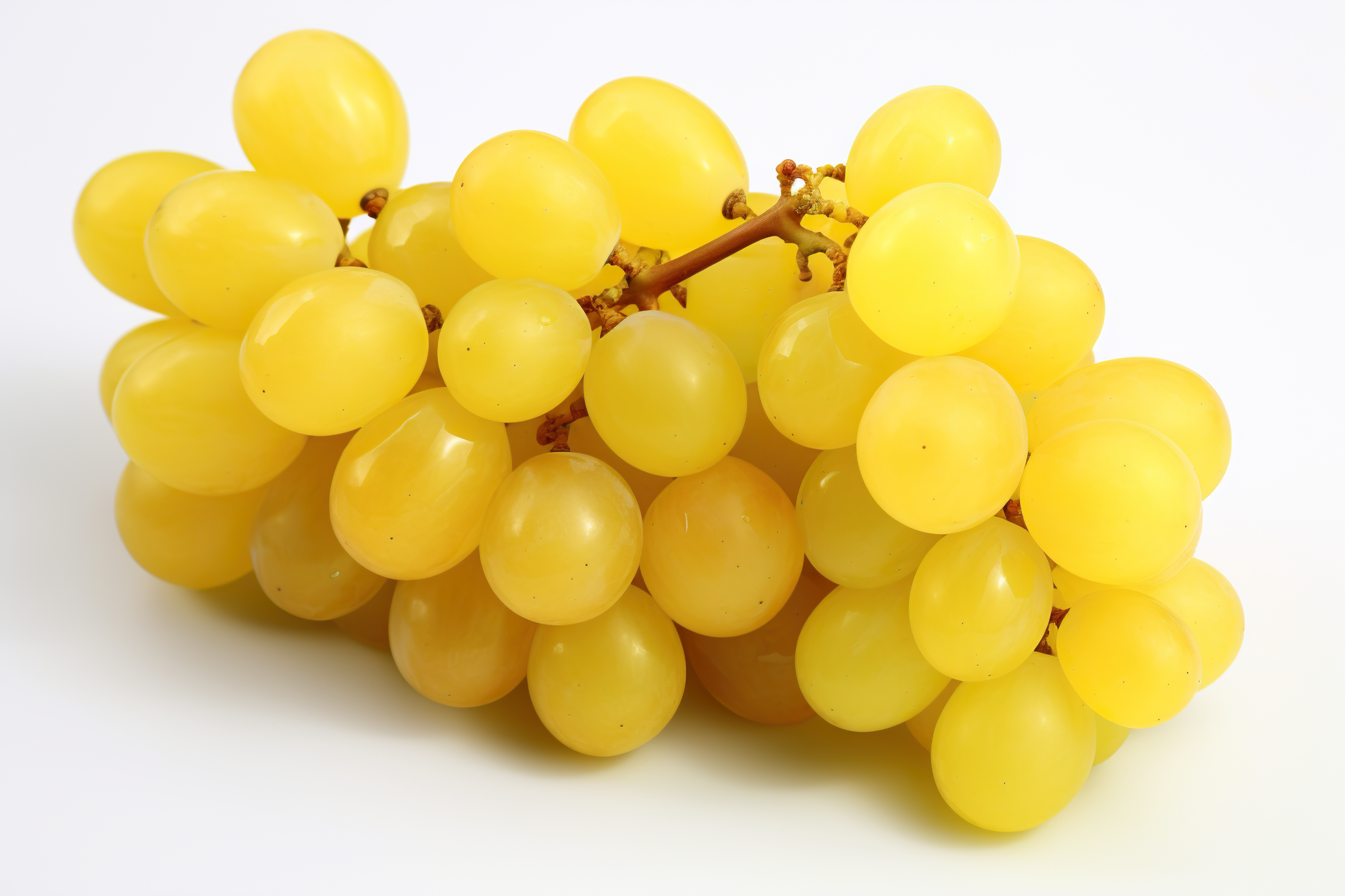 Ripe yellow grapes isolated on white background